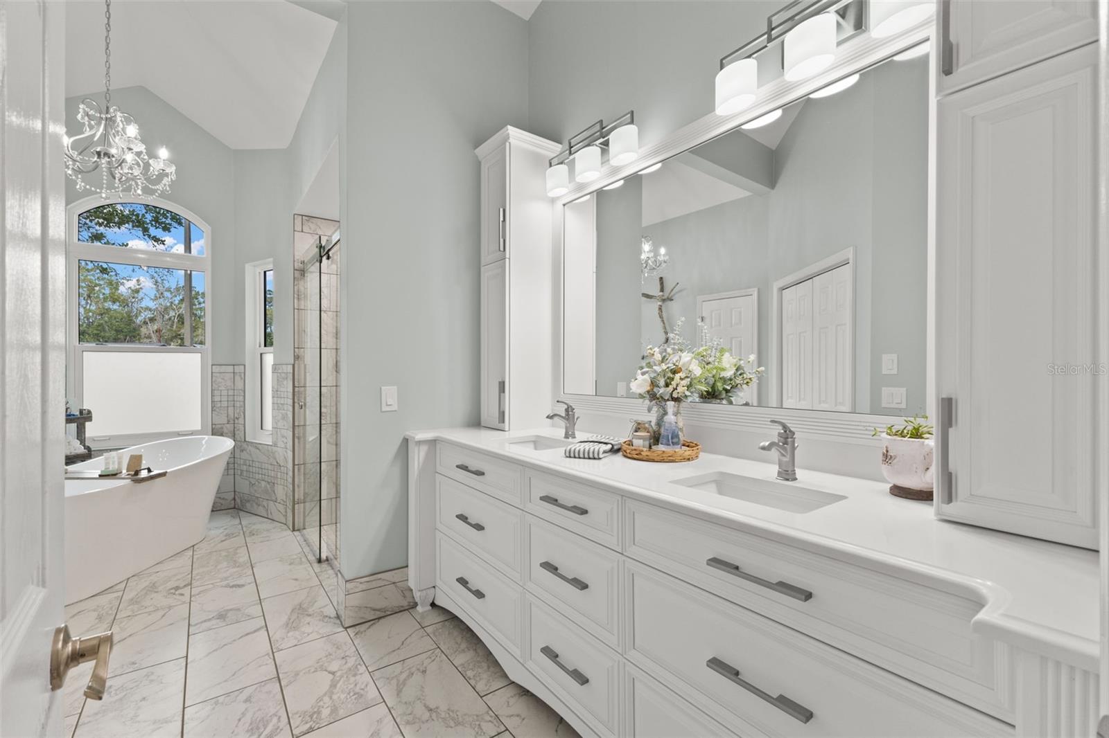 Newly updated Primary bath with custom cabinetry