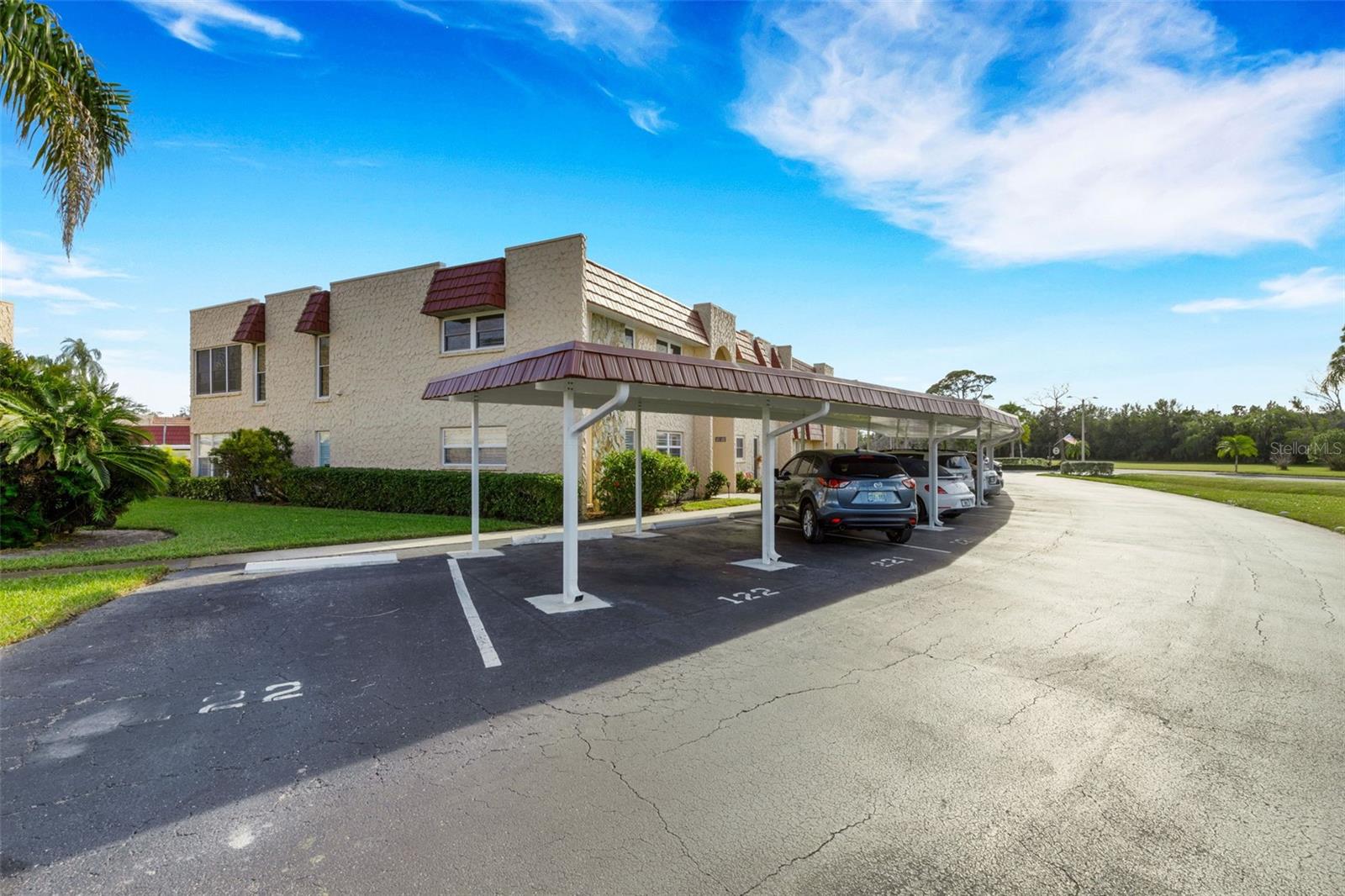 Unit 122 Carports. 1 Covered and 1 Open