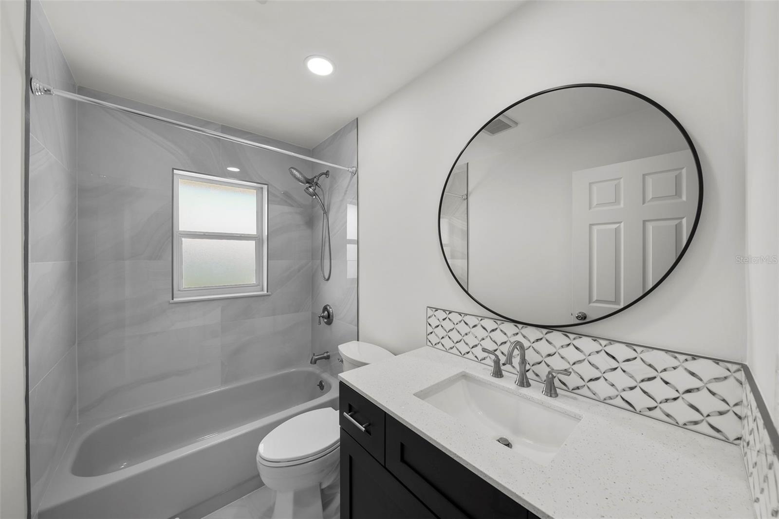 Thoughtfully designed details are showcased in this 2nd bathroom.