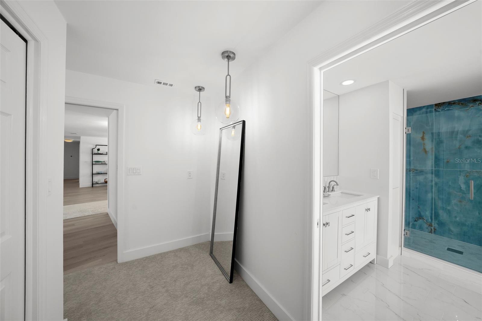 An elegant bonus nook designed for a vanity, mirror, or custom built-in.