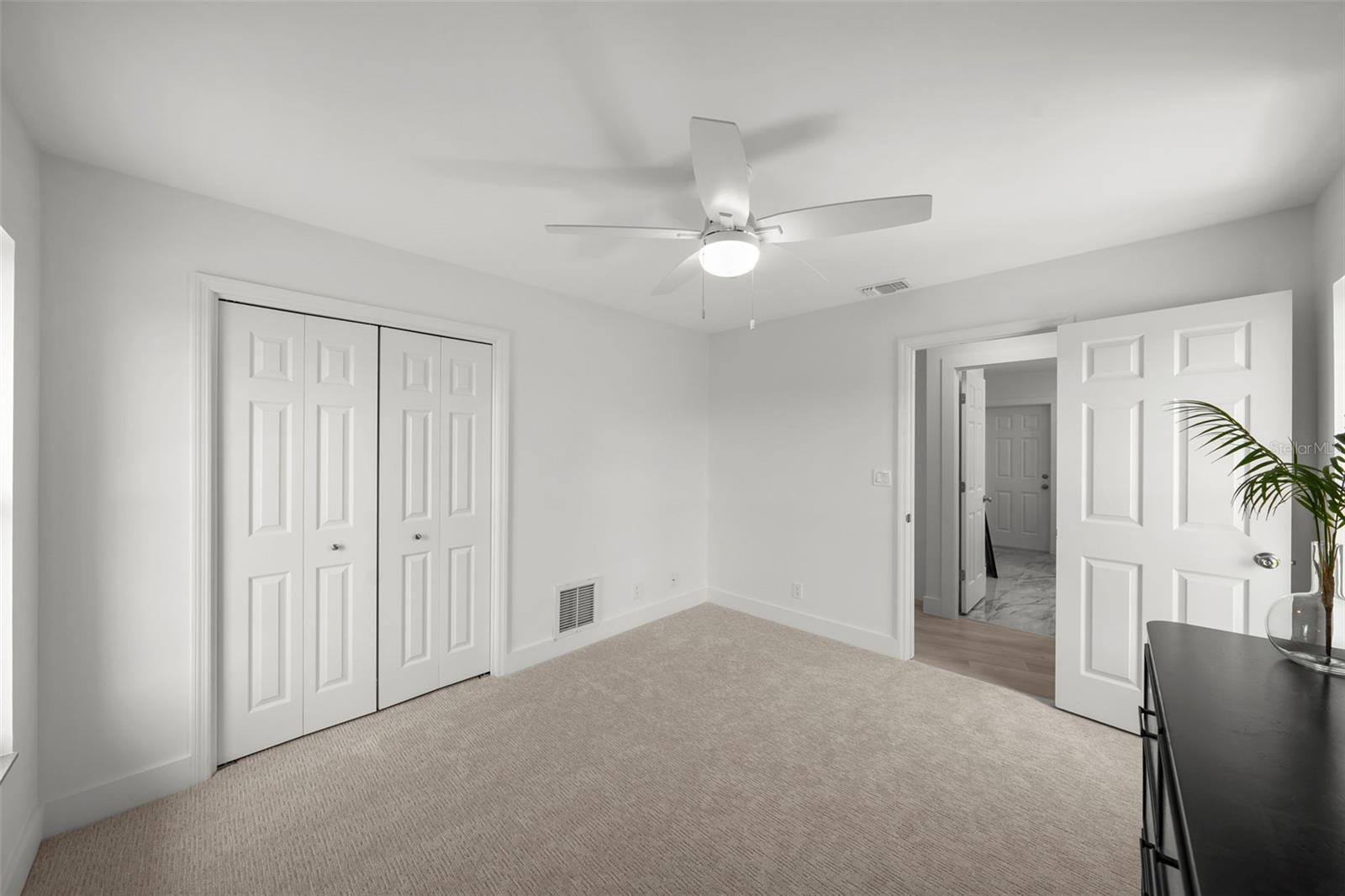 The 3rd bedroom is located at the rear of the home, providing a peaceful retreat for family or guests.