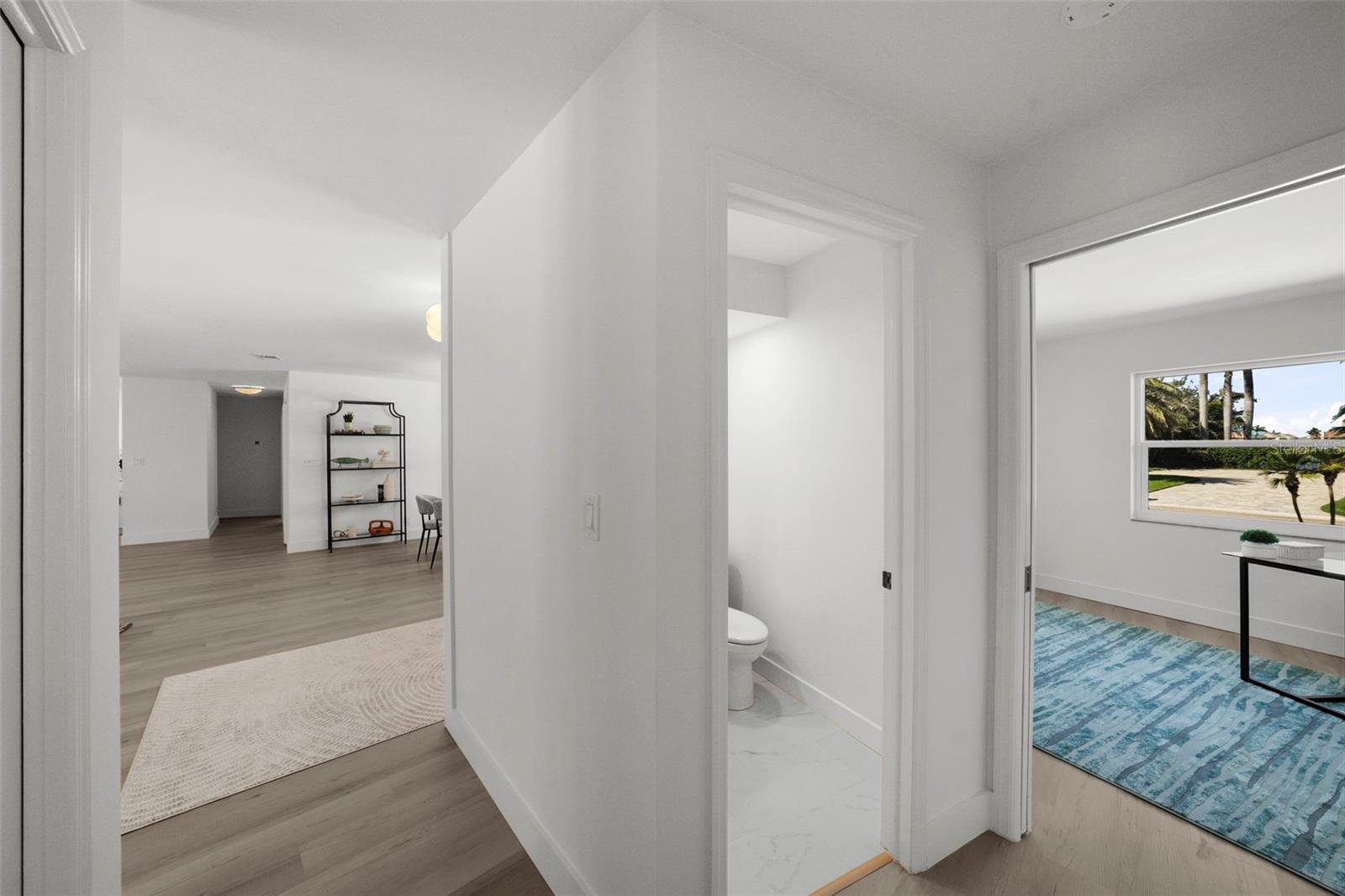 With each bedroom tucked in it's own corner, this 4th bed/office offers easy access to its own half bath.