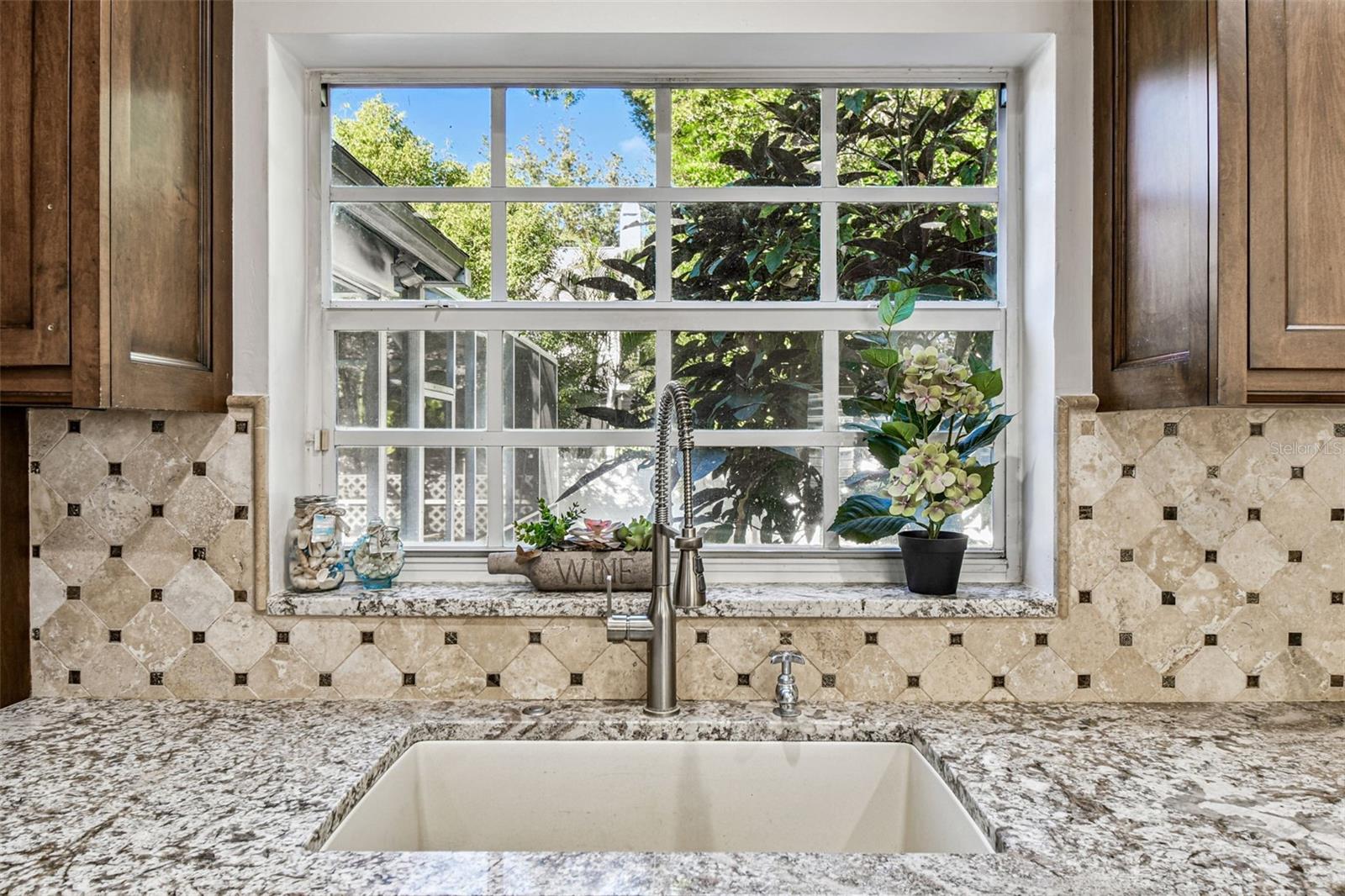 Window overlooking backyard in kitchen