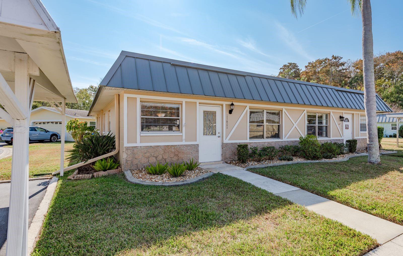 Location, location, location! Great curb appeal, private carport (most in the community are shared carports) Lots of natural lighting.