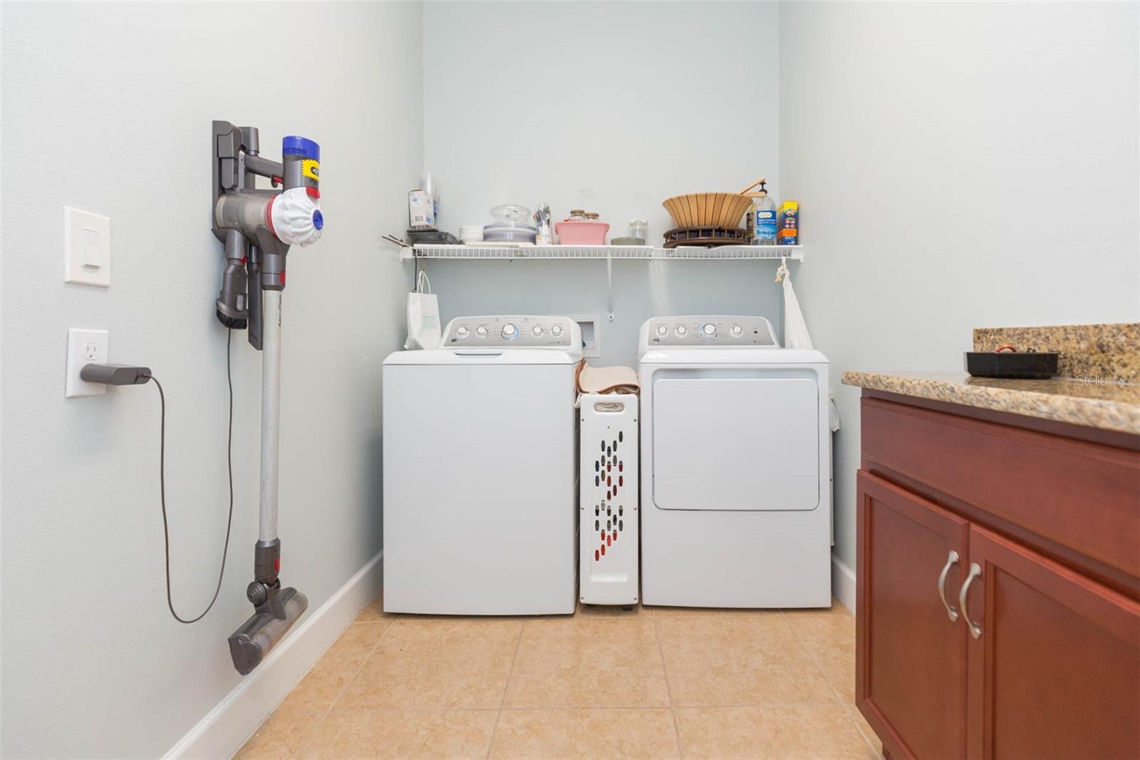 Laundry room with granite folding table
