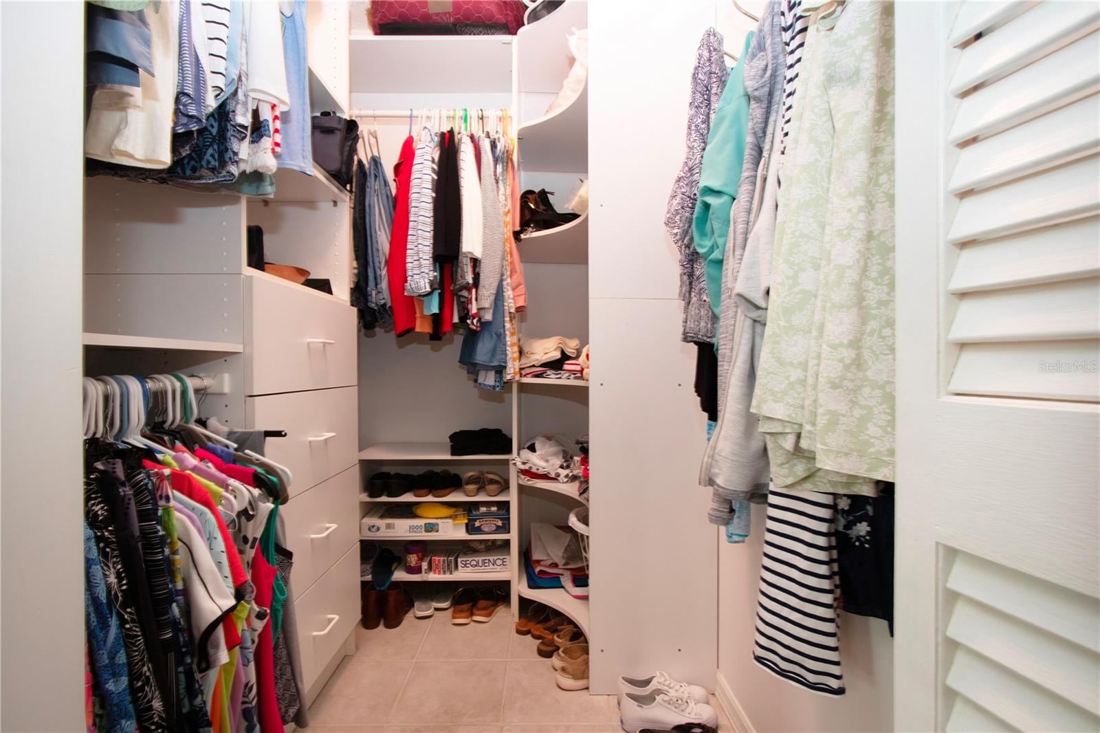 Walk in Closet 1 of 2 with built-ins