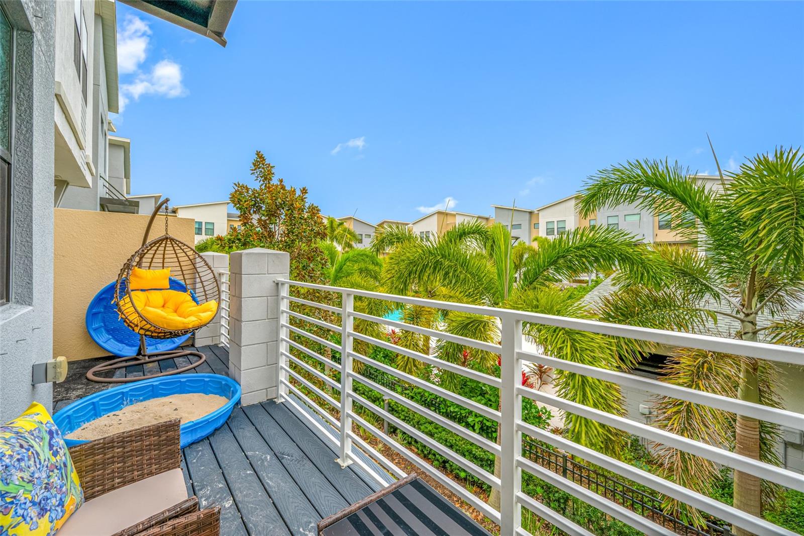 Second Floor private balcony overlooking the pool and courtyard