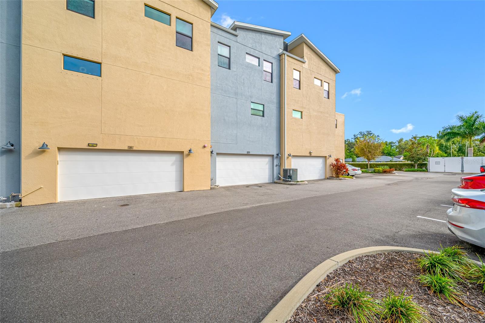 1171 25th Lane N, St Petersburg, FL 33713 - 3 bed, 3.5 bath, 2 car garage, townhome overlooking pool and courtyard in Uptown Kenwood.