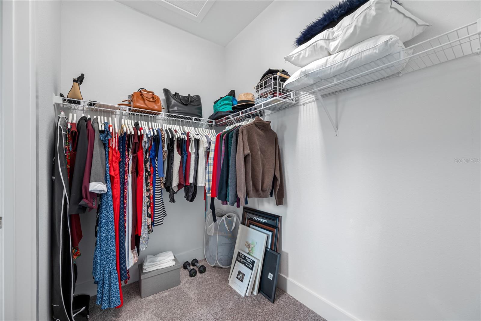 Large primary suite features 10ft ceilings, walk-in closet, ensuite bathroom with dual vanity and walk-in shower. Third Floor