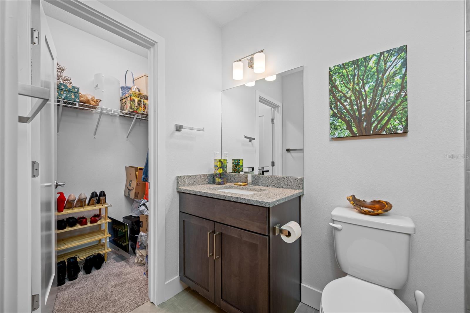 Full bathroom with walk-in shower. First Floor - 3rd Bedroom with en-suite full bathroom & walk-in closet.