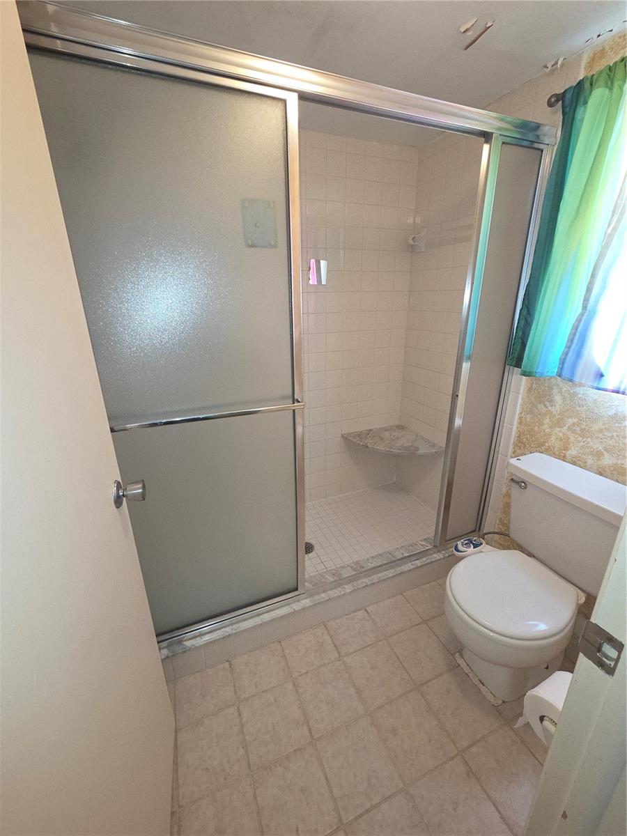Primary In-suite has a walk in shower & private toilet room and a window !