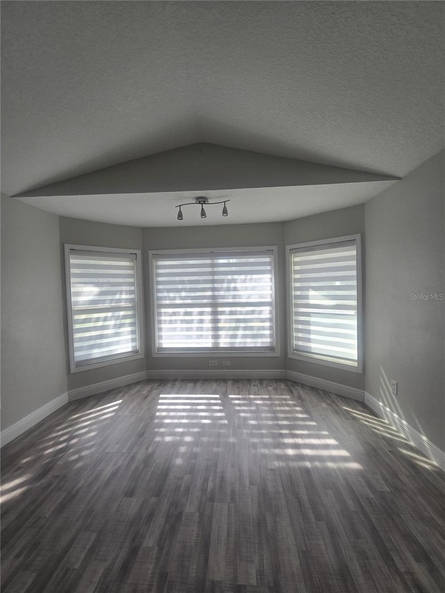 Breakfast nook area with window treatments