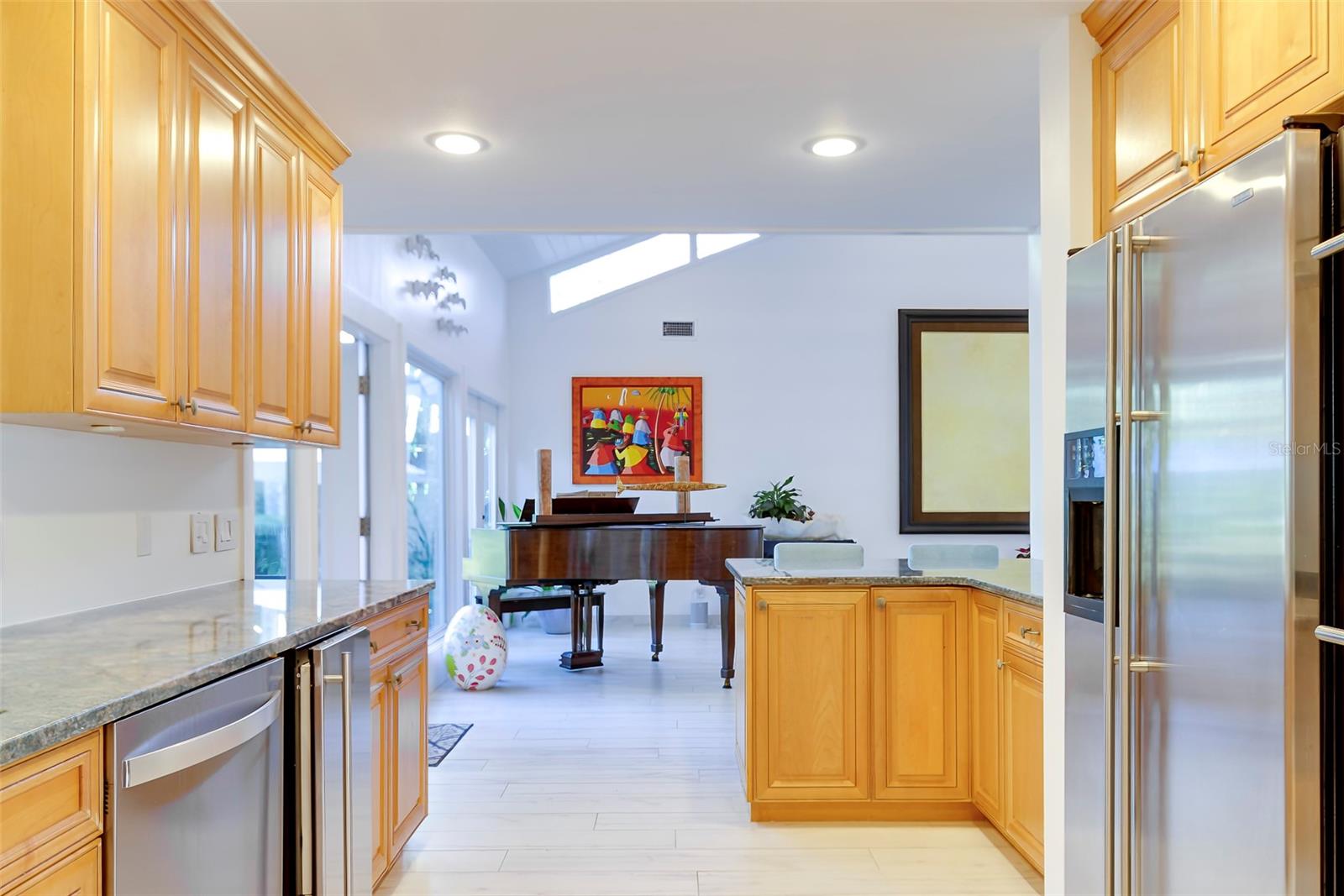 All flooring on the ground level was replaced with porcelain, wood-plank tile.