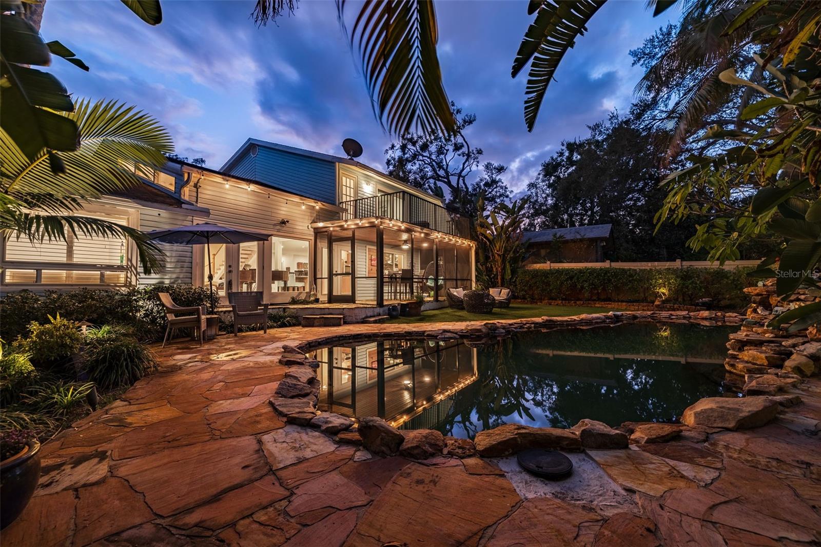 Exquisite landscape lights frame a perfect outdoor event. Many elegant outdoor concerts have been enjoyed in this very spot.