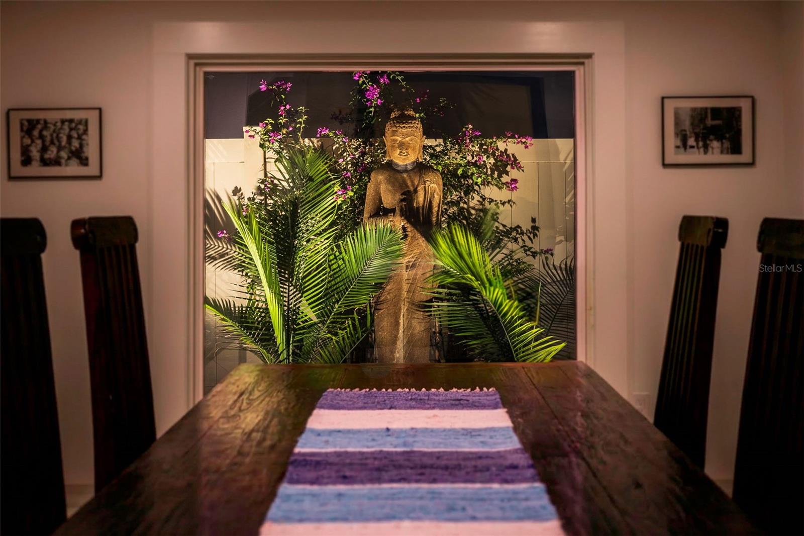 The idyllic dining room for a dramatically-lit dinner party. Garden statuary does not convey but could be negotiable.