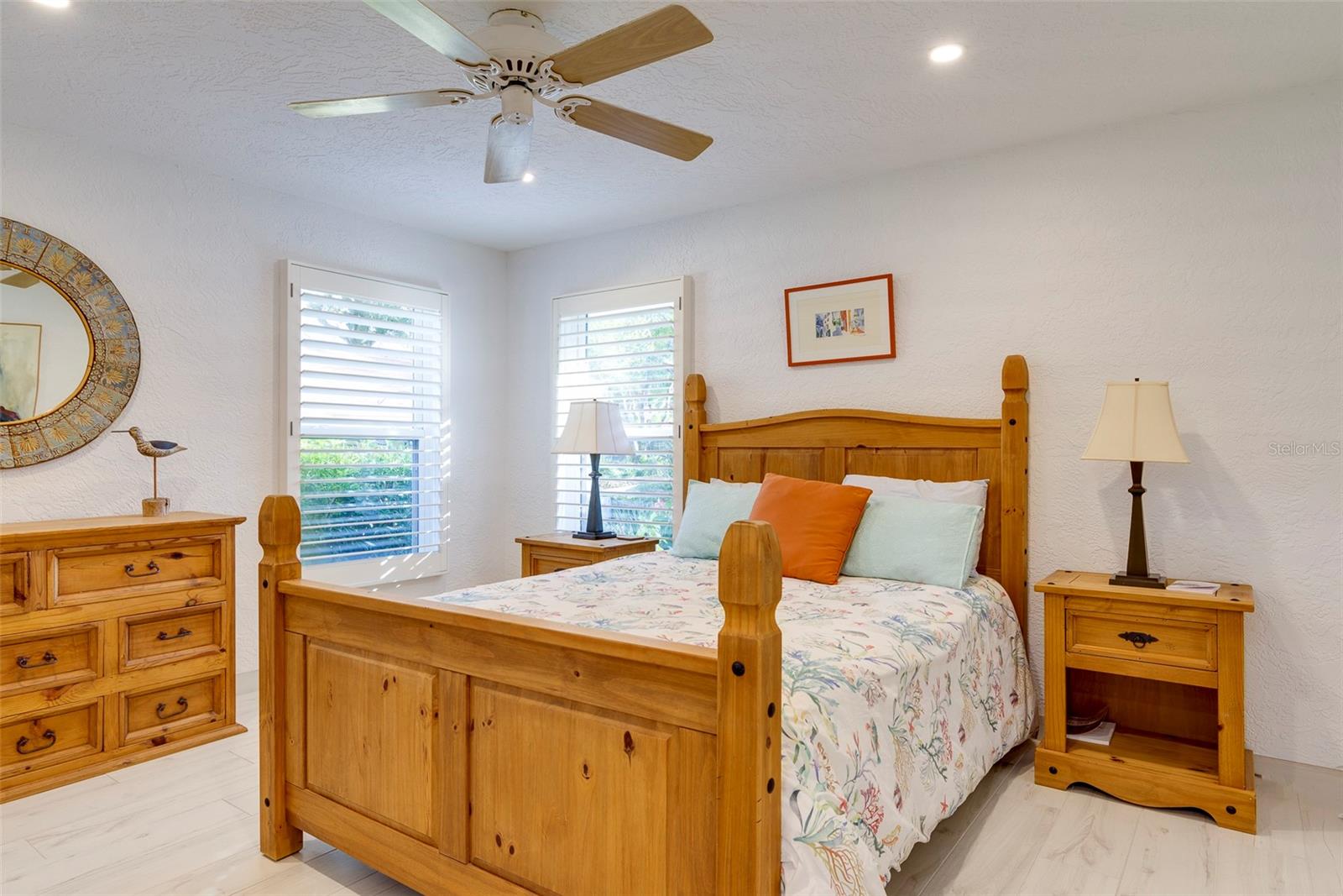 The downstairs 3rd bedroom is light and spacious, overlooking the front landscaping.