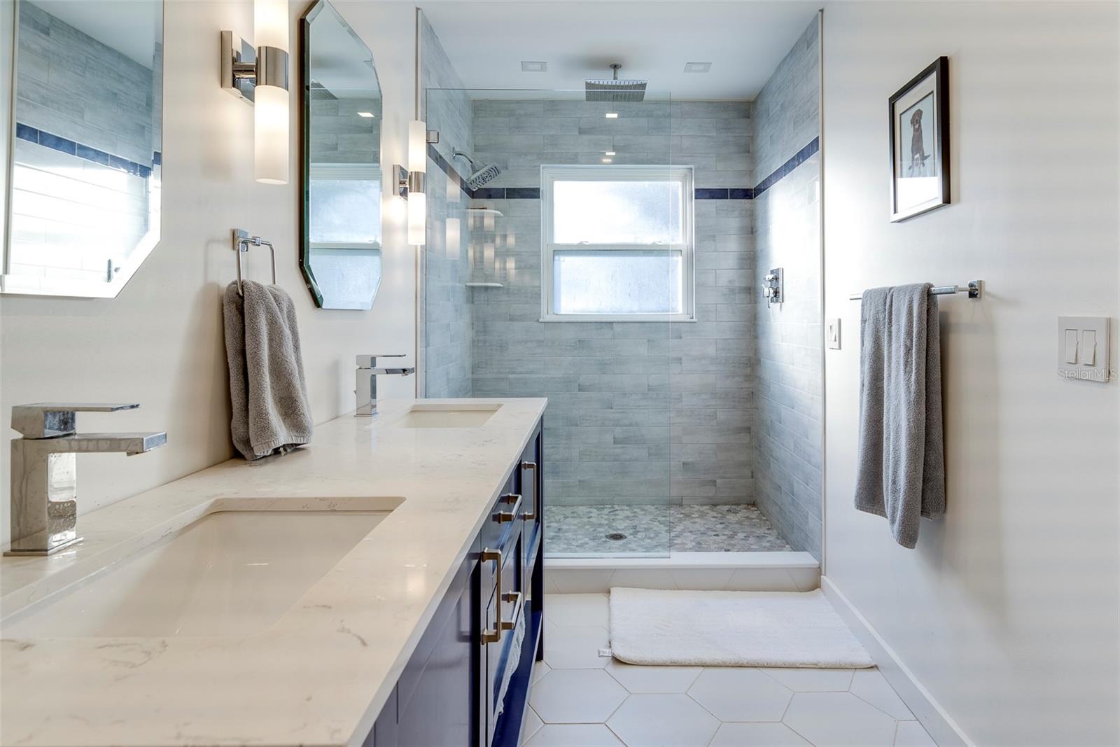 Primary bath with step-in shower.