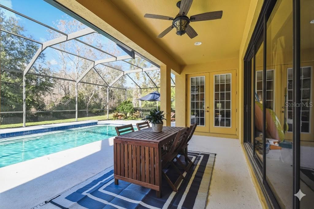 Covered lanai with telescoping sliders