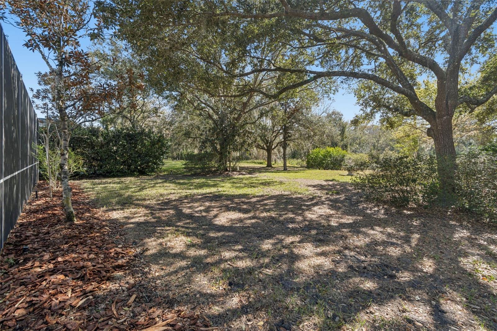 deep lot with water and wooded view