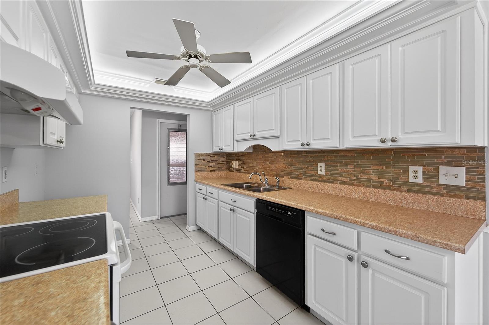 kitchen w view of garage entry door