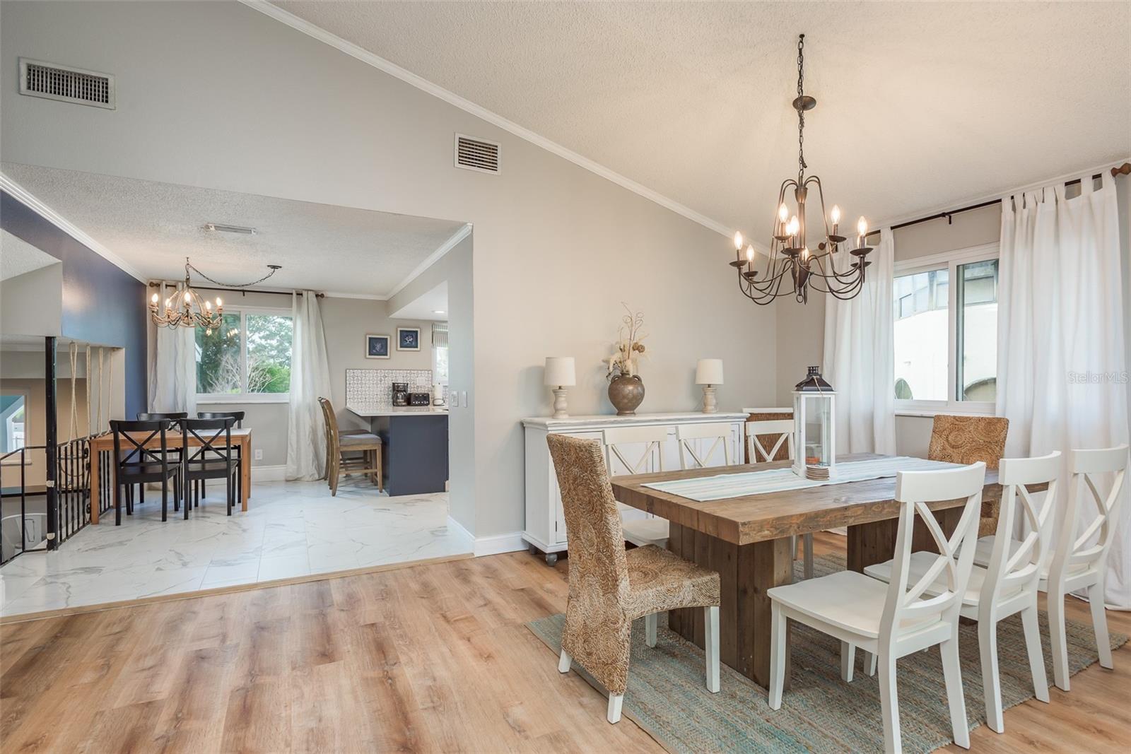 Dining room area with view of eating area in kitchen