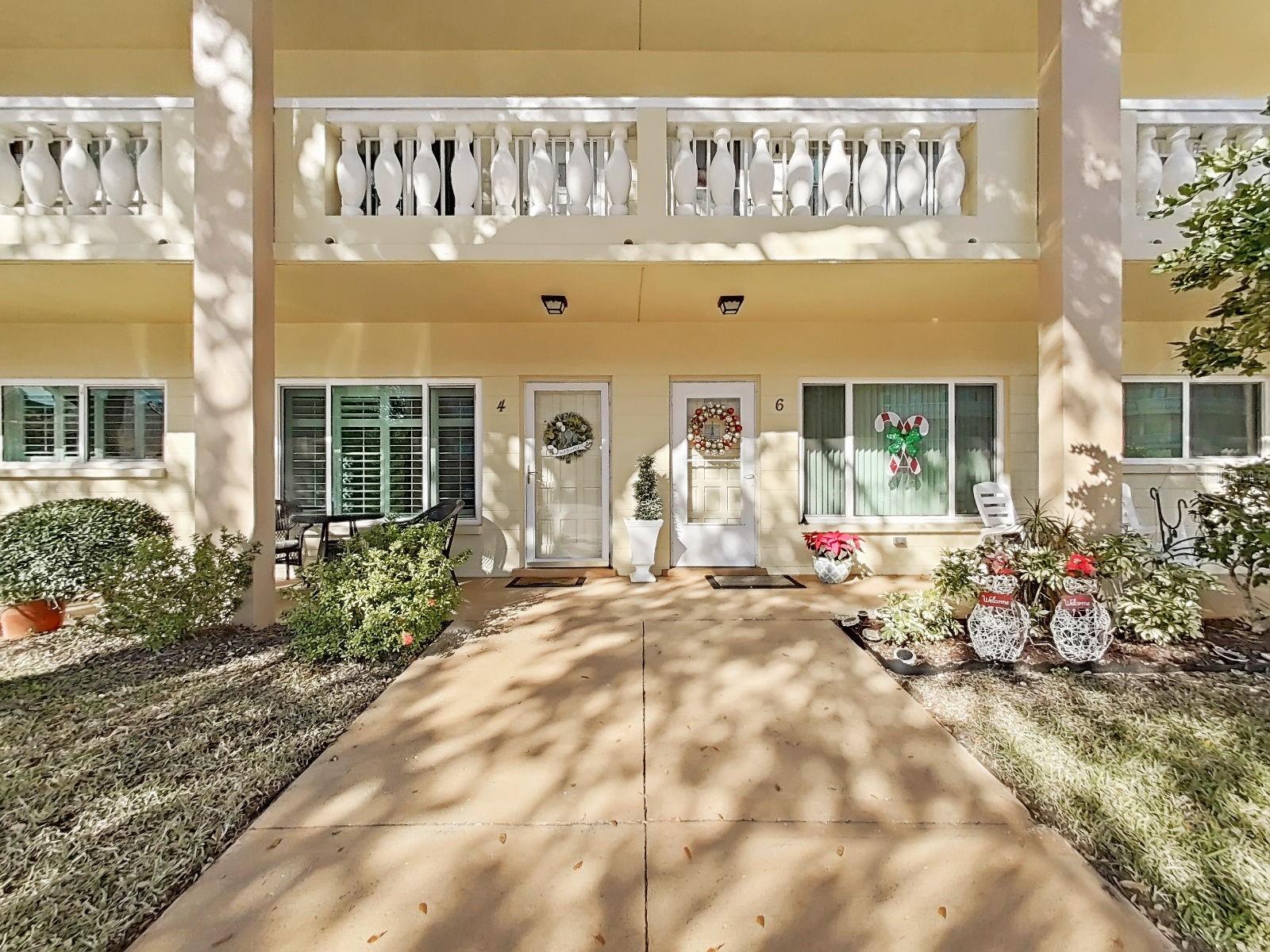 Shady covering of the balcony above keeps your front patio cooler.
