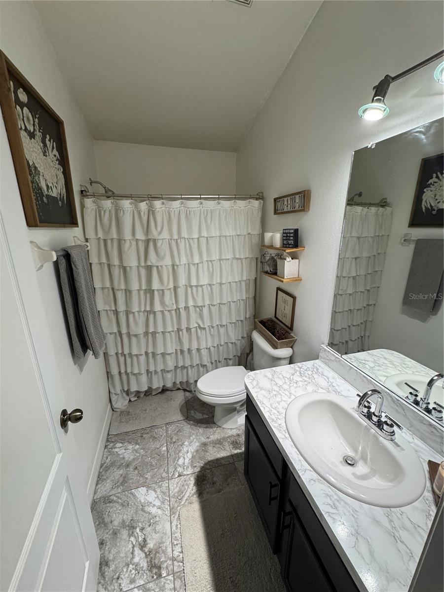 Guest Bathroom with Tub and Shower