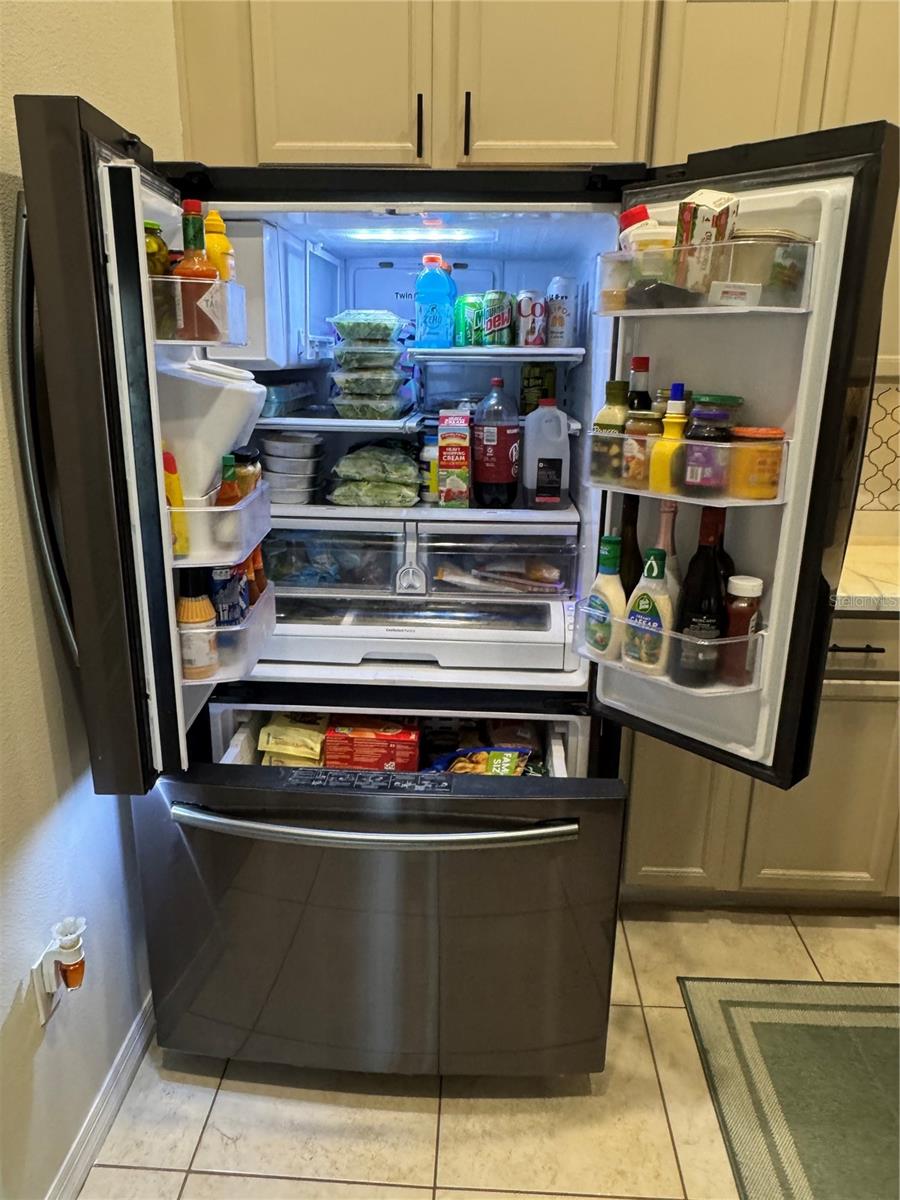 Tons of space above and below. With available app, see inside refrigerator from stores to stock up on missing items