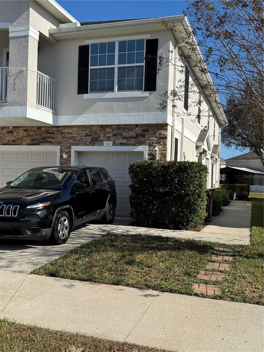 Side entrance to 2nd floor condominium