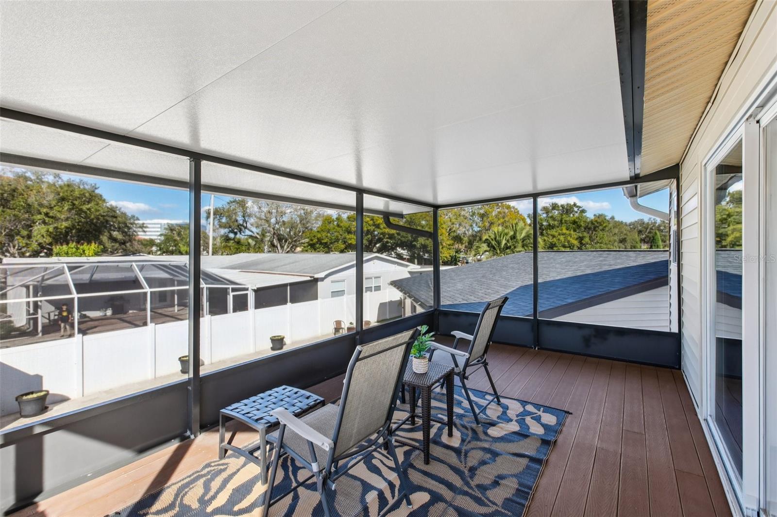 Screened Lanai for private upstairs guest suite.