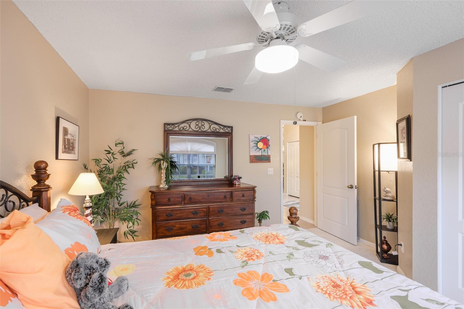Beautiful second bedroom with a neutral palette.