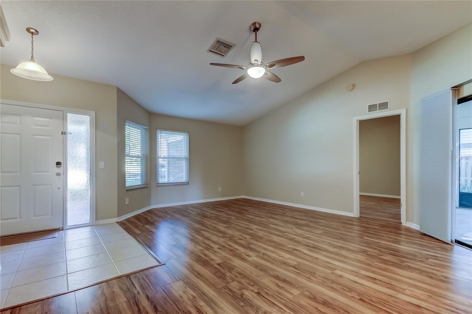 8a. Main Living Room in Front of Home (17.8 ft x 17.8 ft)