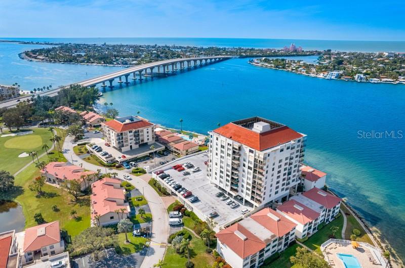 BRIDGE LEADING INTO ST PETE BEACH. VIEW OF THE BOCA CIEGA BAY AND GULF OF MEXICO.