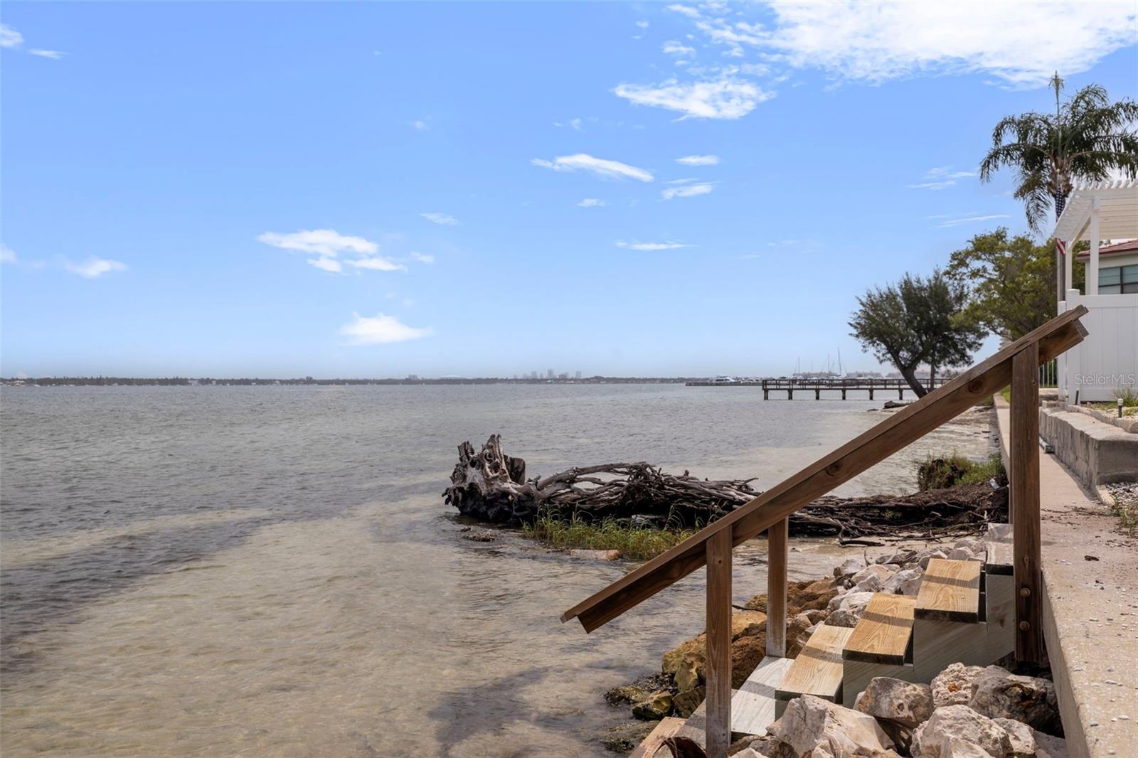 WAILK DOWN THE STAIRS INTO THE BOCA CIEGA BAY AND LAUNCH YOUR KAYAK