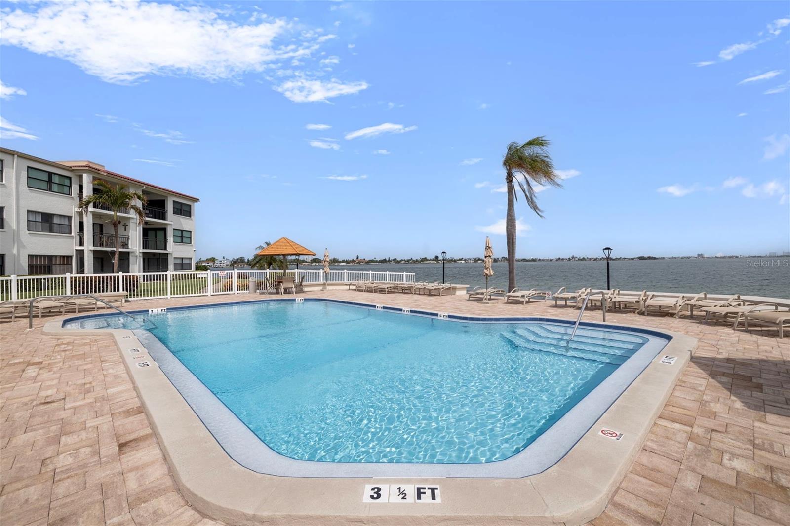 HEATED POOL OVERLOOKING THE BOCA CIEGA BAY