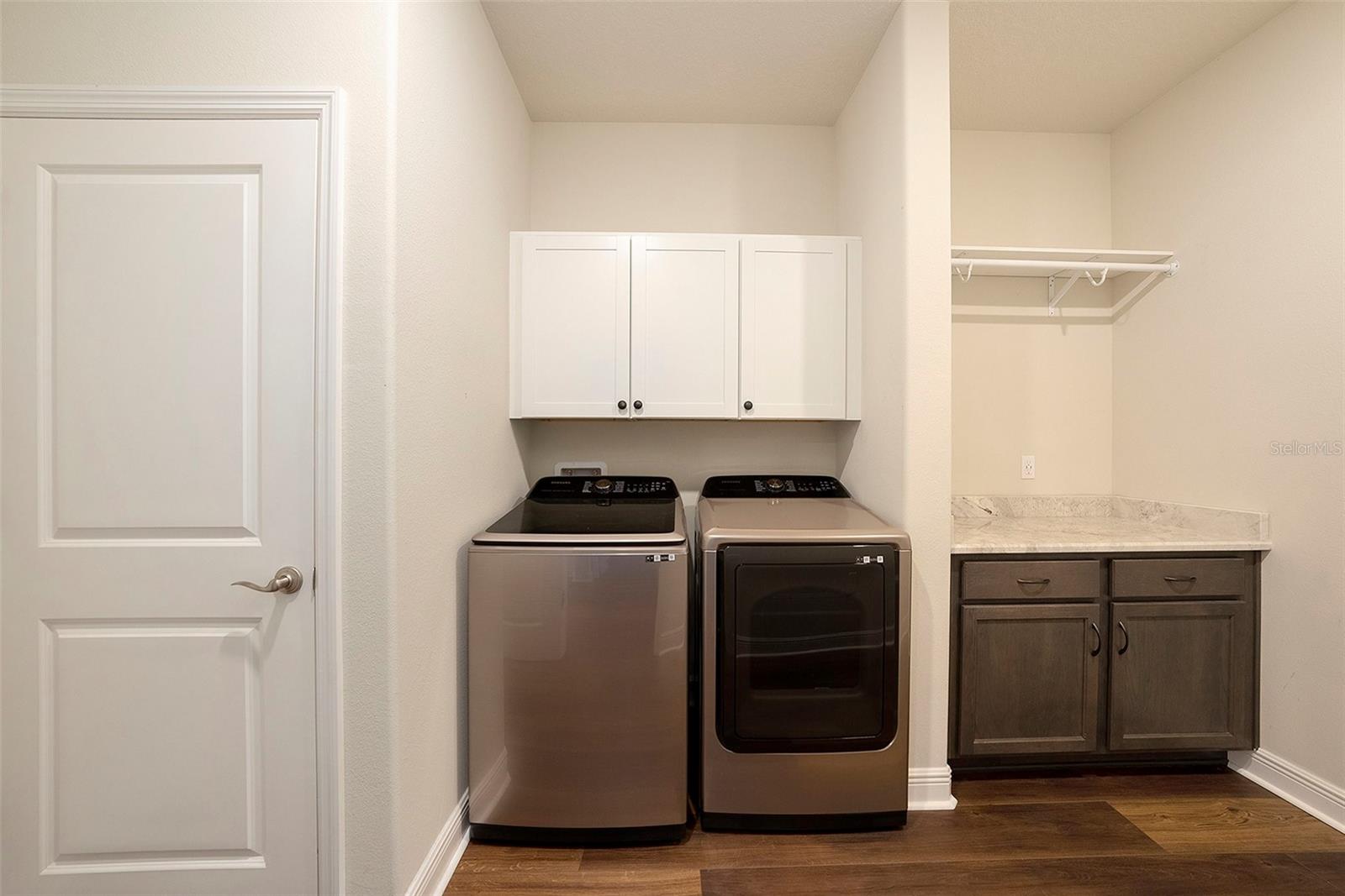 Laundry room - washer and dryer convey