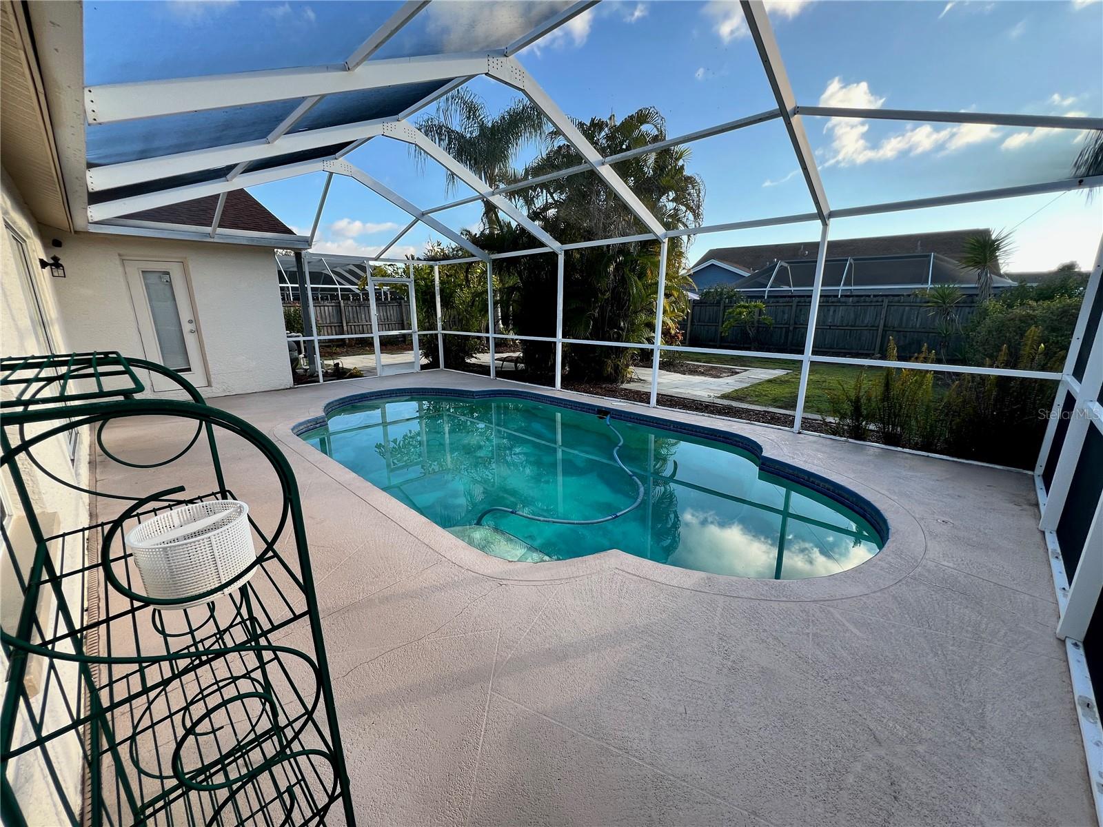 Screened-in swimming pool.