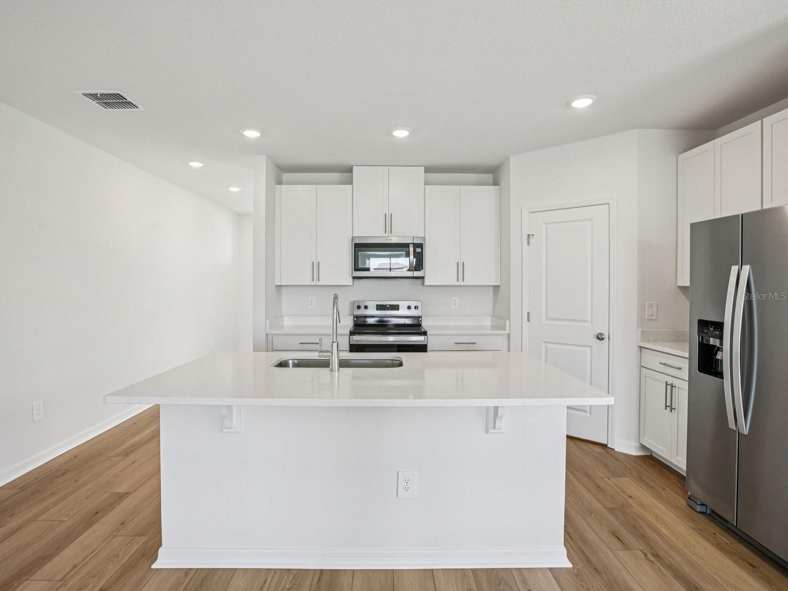 Interior photos are not of the actual home but are photos of the builder home with the same floorplan with similar interior finishes and features.