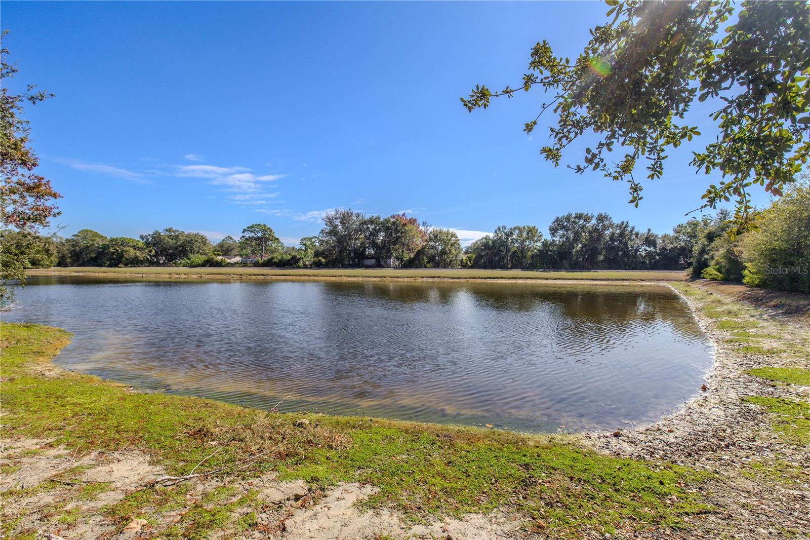 Enjoy serene pond views and a peaceful natural backdrop just steps from home—perfect for relaxing walks and taking in Florida’s sunshine.