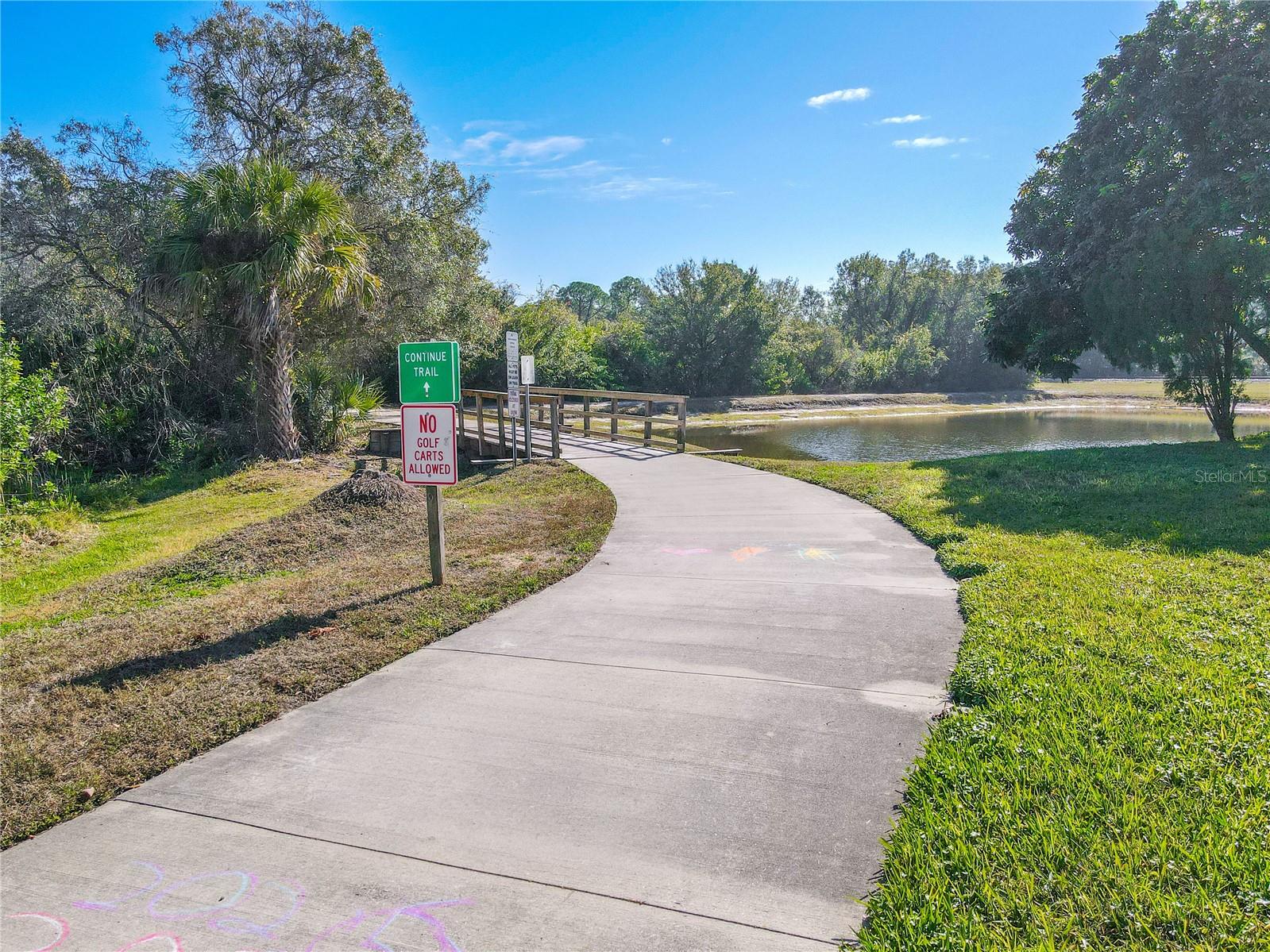 Enjoy easy access to the Oldsmar Trail, a scenic paved path perfect for biking, walking, and enjoying peaceful water views just minutes from home.