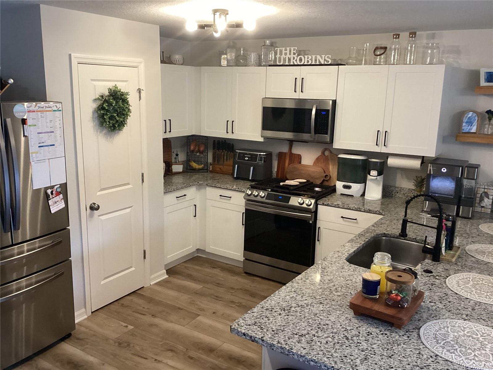 Stainless appliances. Handy closet pantry.