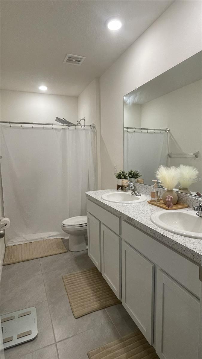 Primary Bathroom - Dual Vanities