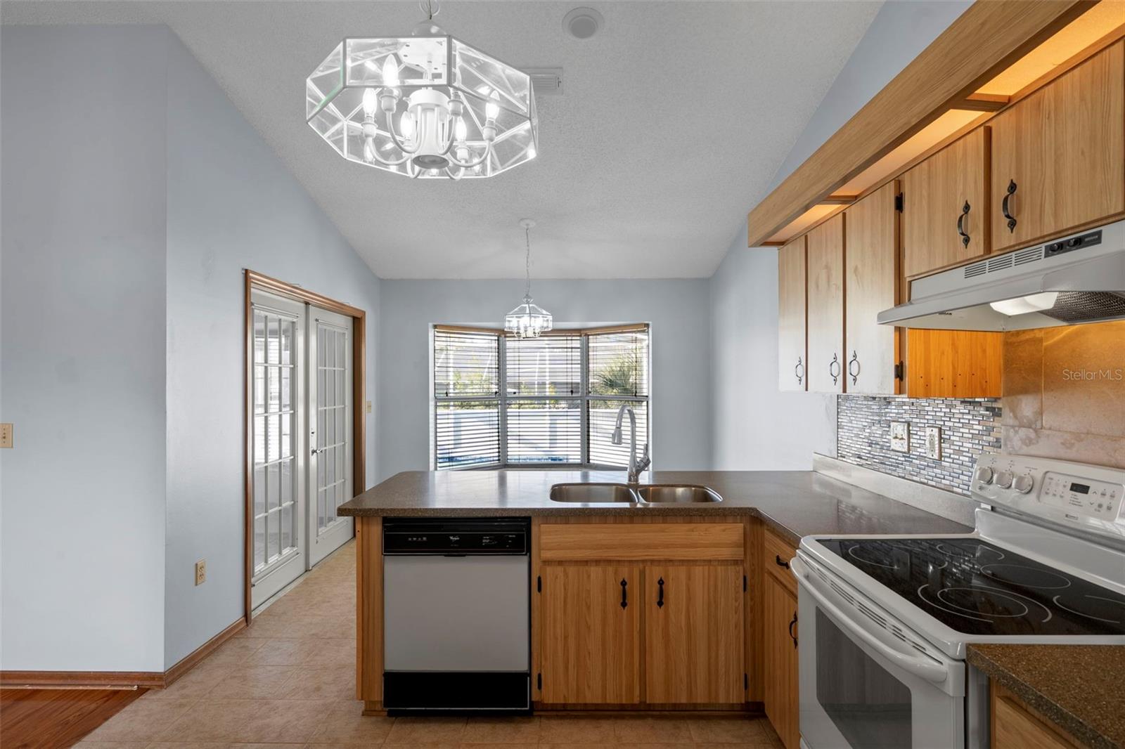 Kitchen with dishwasher and stove