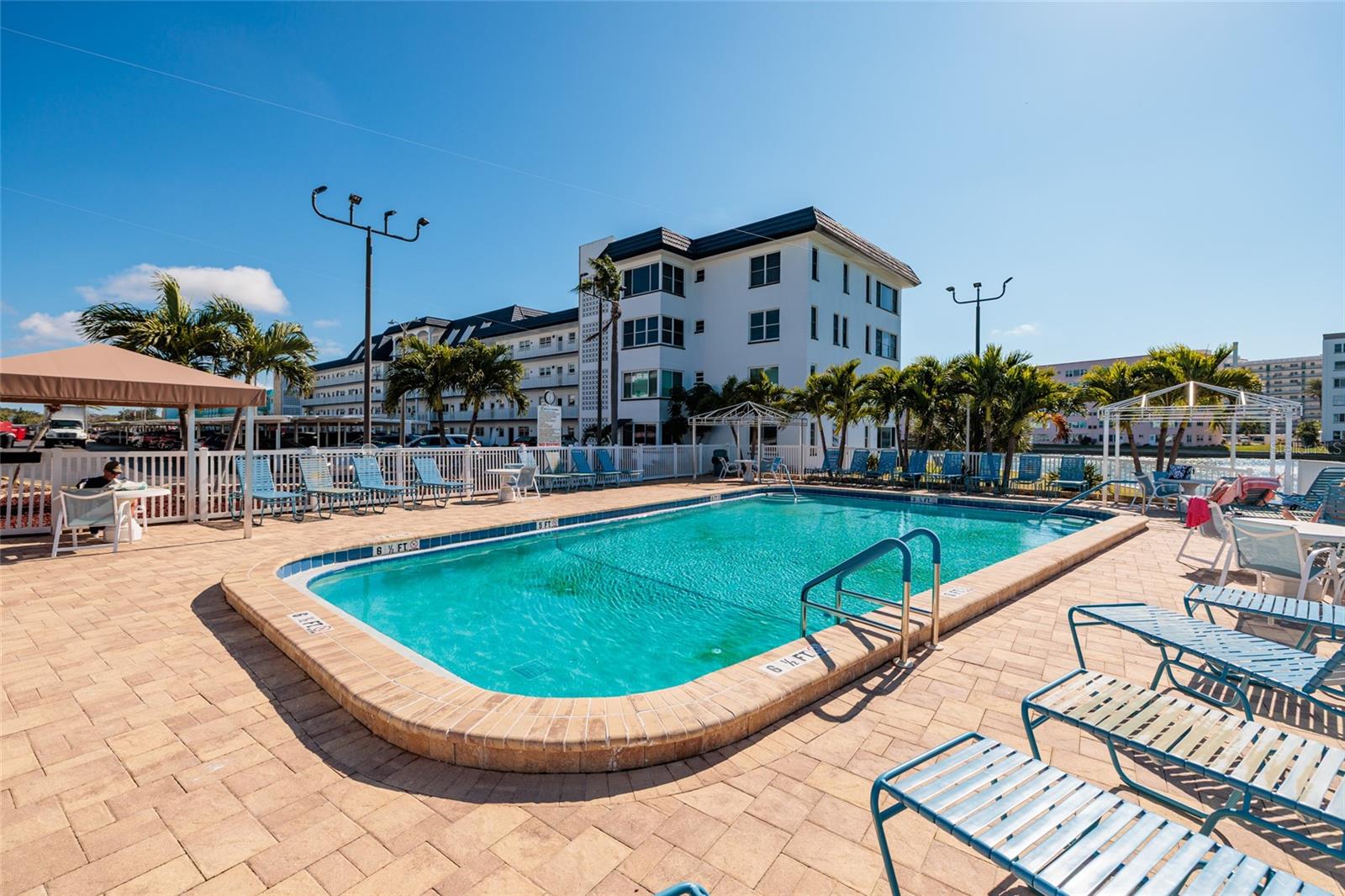 Heated pool next to unit bldg w/outside bath access.