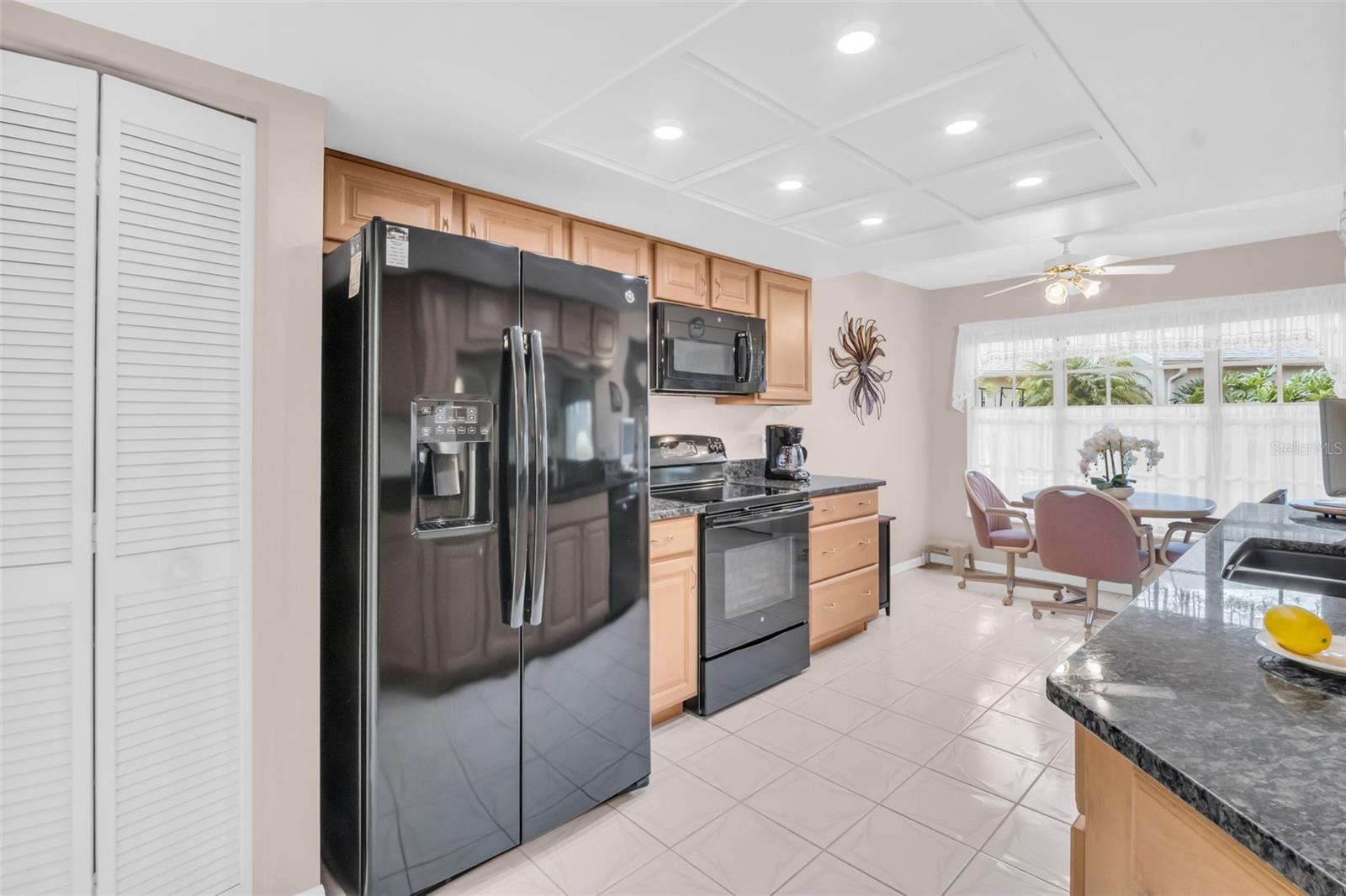 Oversized kitchen pantry closet and abundant countertop space for food prep~
