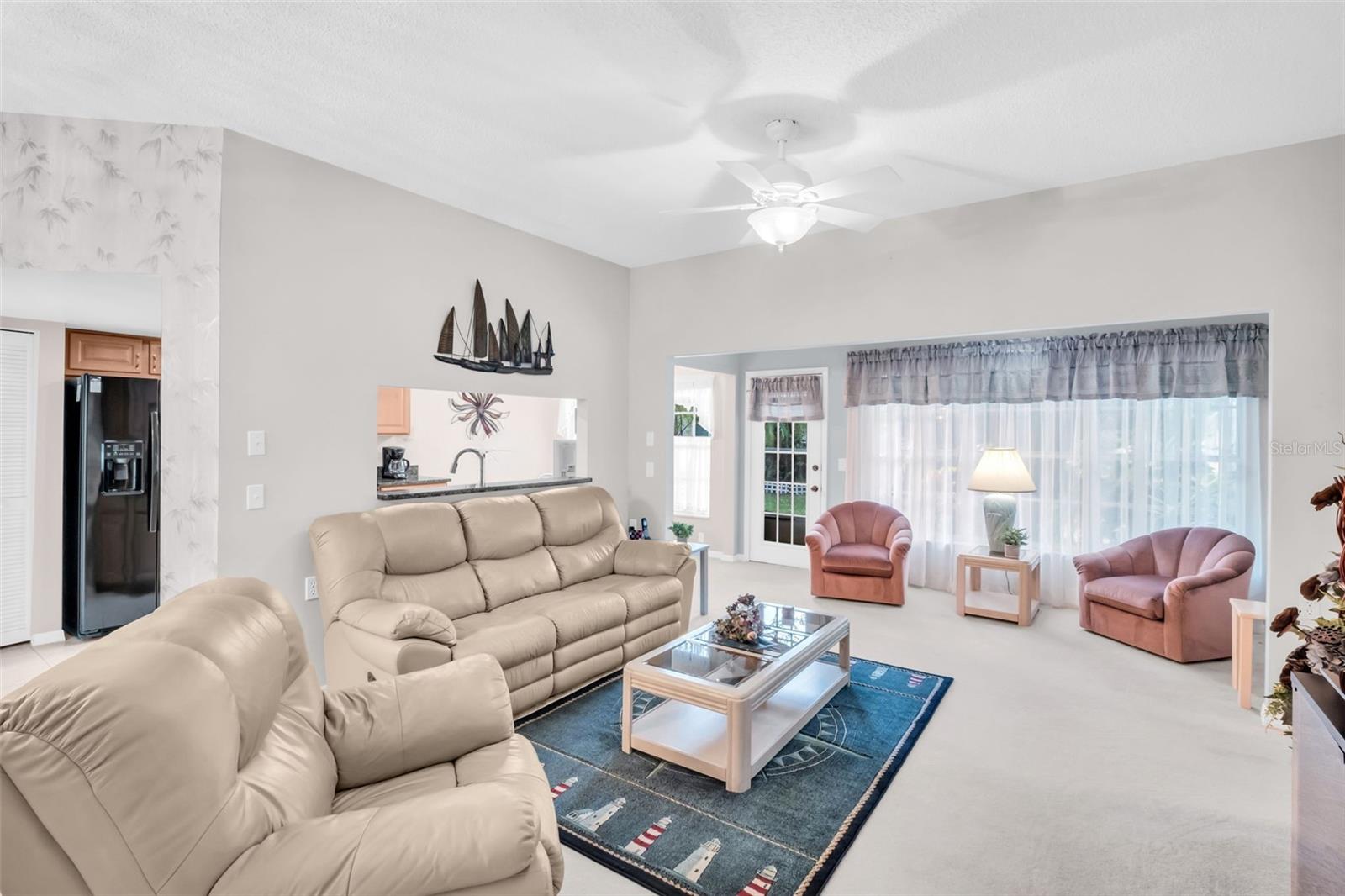 Kitchen pass-through window open to main living making entertaining a breeze~