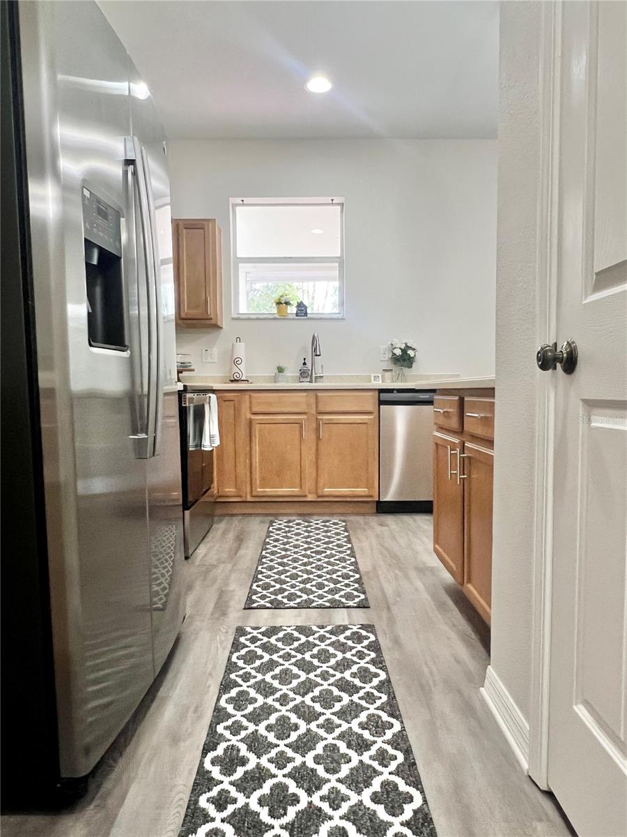 Brand new luxury vinyl plank flooring in the kitchen and the whole first floor!