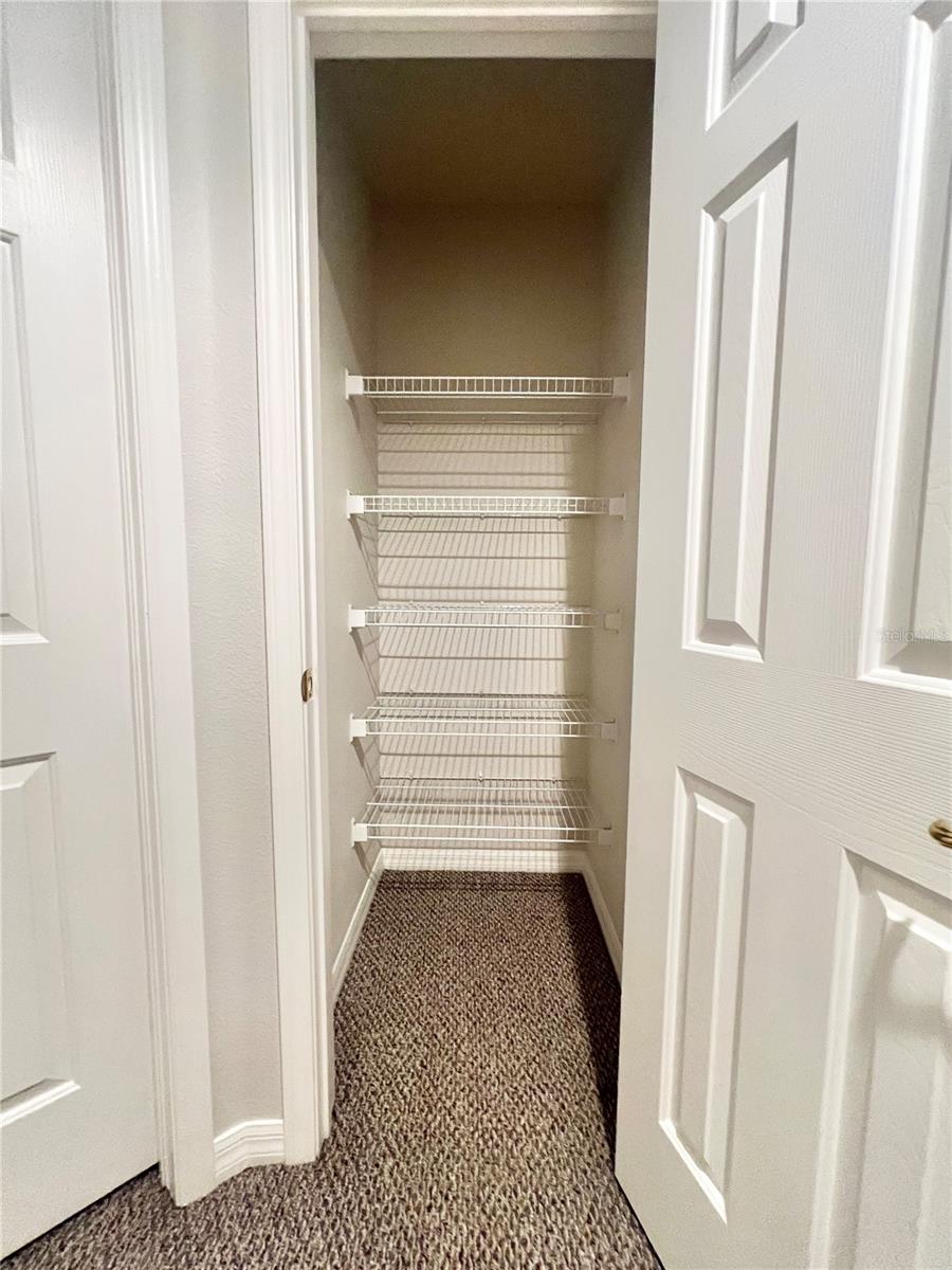 A deep linen closet upstairs in the hallway.