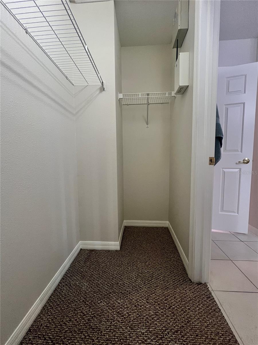 The primary walk-in closet is huge!
