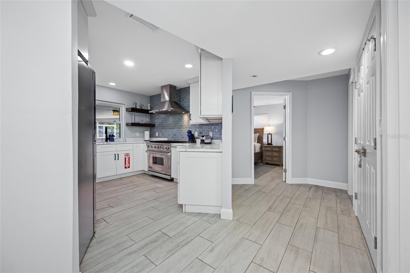 Hallway leading to Kitchen and Bedroom 4